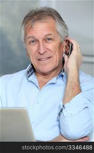 Closeup of senior man talking on the phone