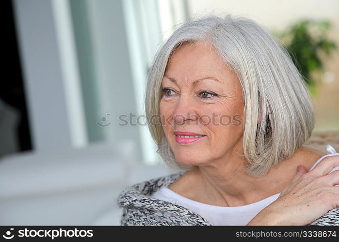 Closeup of senior woman relaxing at home