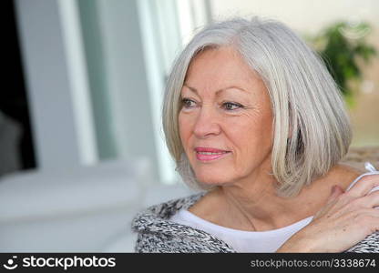 Closeup of senior woman relaxing at home