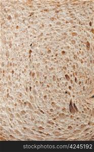 closeup of slice of light brown wheat bread