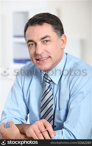 Closeup of smiling businessman