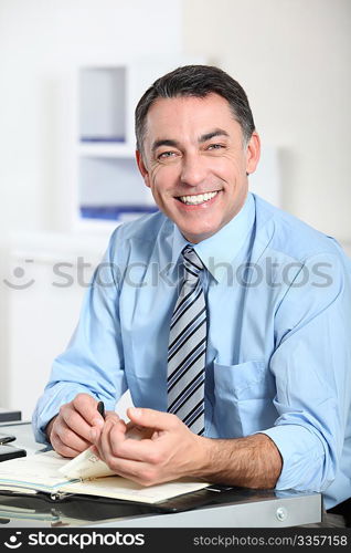 Closeup of smiling businessman