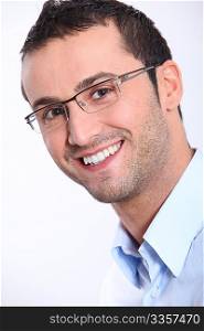 Closeup of smiling man with eyeglasses