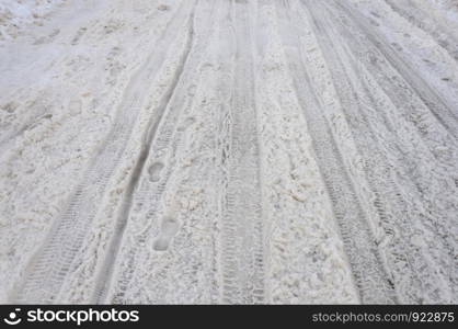 Closeup of snowy road background, winter day