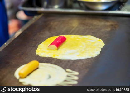 Closeup of Soft Waffle, Roll pancake stuffed, Thai dessert, background, thai street food market