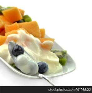 Closeup of Spoon With Fruits And Yogurt