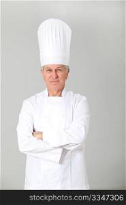 Closeup of standing chef on white background