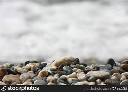 Closeup of stones on the seashore on Greek island Skopelos