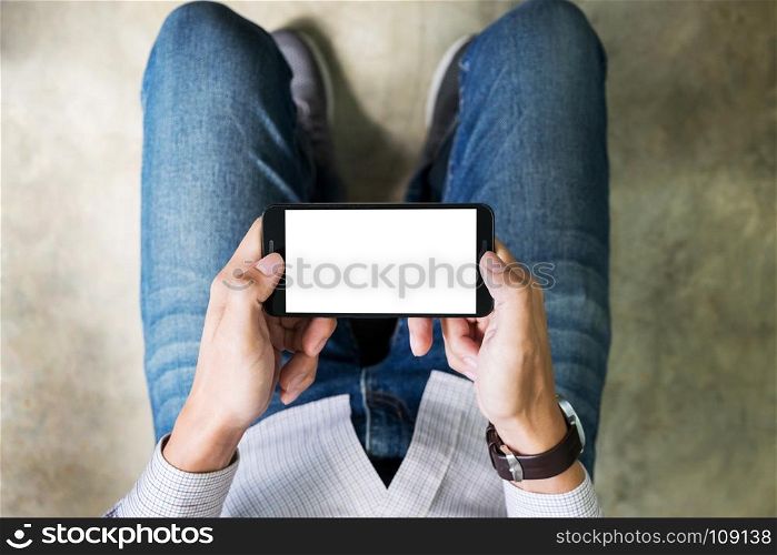 Closeup of Teenager Playing videogames On Mobile phone