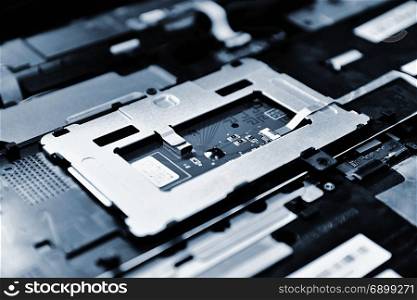 Closeup of the chip of the old notebook computer motherboard.