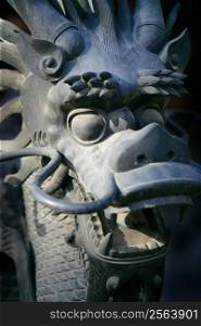 Closeup of the dragon in the Imperial Palace in Beijing, China. (short depth of field, focusing on the eye)