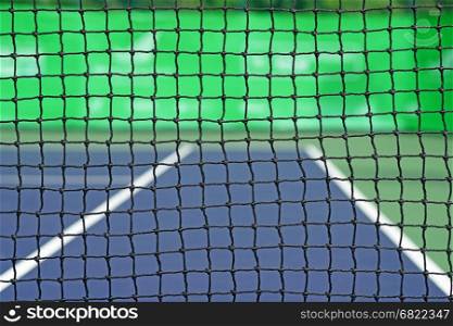 closeup of the net in tennis court