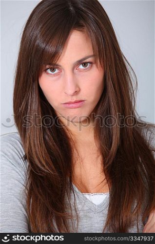 Closeup of upset young woman
