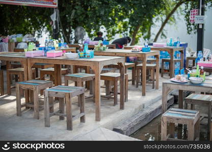 closeup of vintage table and stool set in food shop