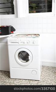 Closeup of washing machine in laundry