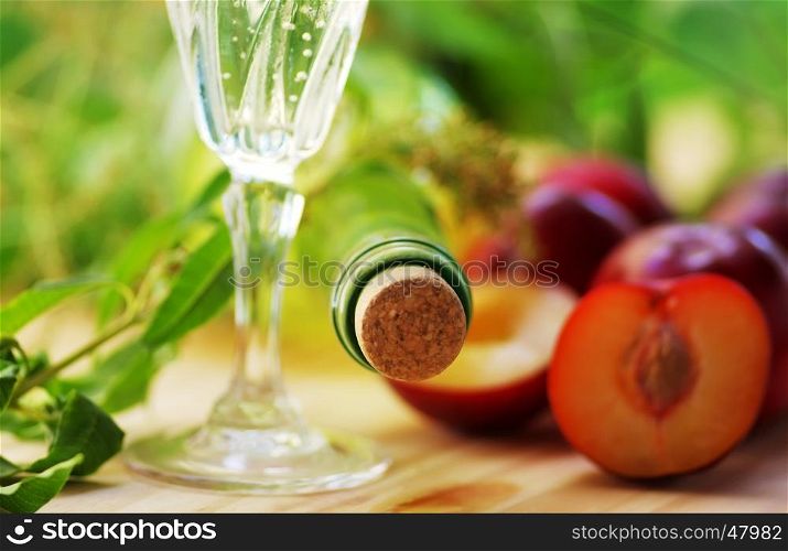 Closeup of wine bottle and wineglass