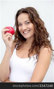 Closeup of woman eating a red apple