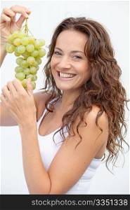 Closeup of woman eating grapes