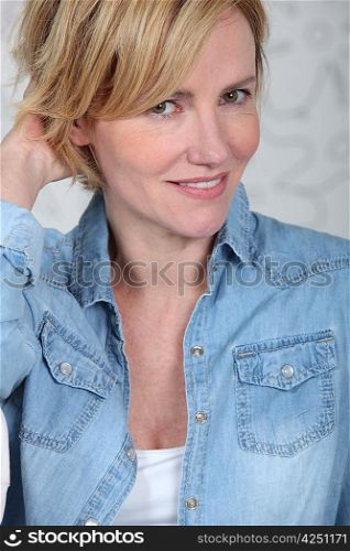 Closeup of woman in a denim shirt