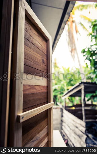 Closeup of wood window detail with through of view