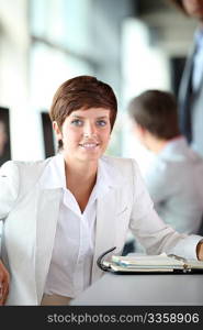 Closeup of young businesswoman in the office