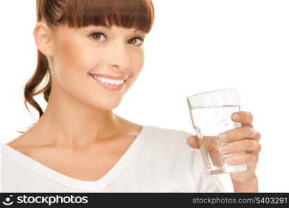 closeup of young smiling woman with glass of water
