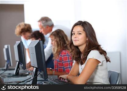 Closeup of young student sitting in class