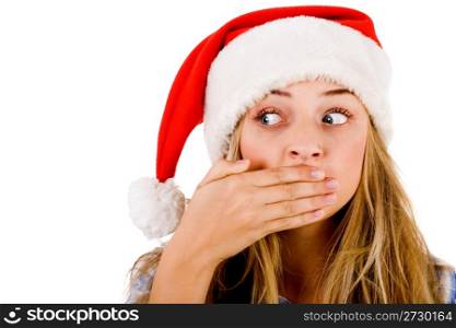 Closeup of young women covering her mouth with both hands on a white isolated background