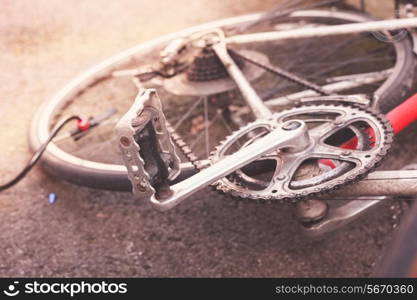 Closeup on a bike on the ground being pumped