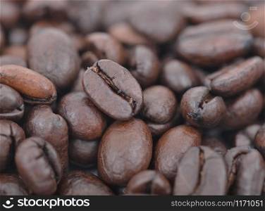 closeup on a coffee bean among other beans