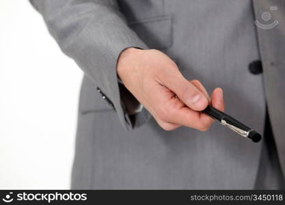 Closeup on a man holding a pen