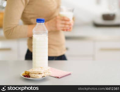 Closeup on breakfast of young woman in kitchen