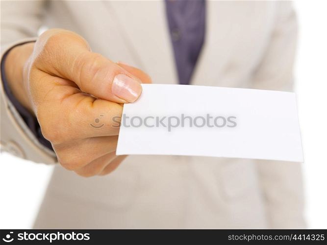 Closeup on business card giving by business woman