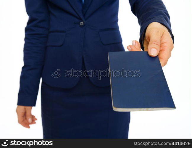 Closeup on business woman giving passport