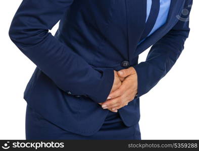 Closeup on business woman having stomach pain
