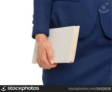 Closeup on business woman holding book