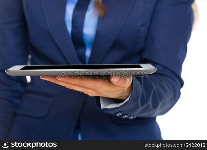Closeup on business woman holding tablet pc