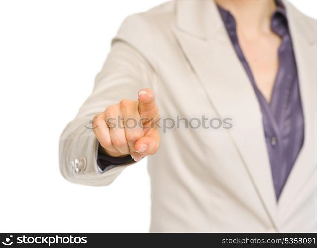 Closeup on business woman pointing in camera
