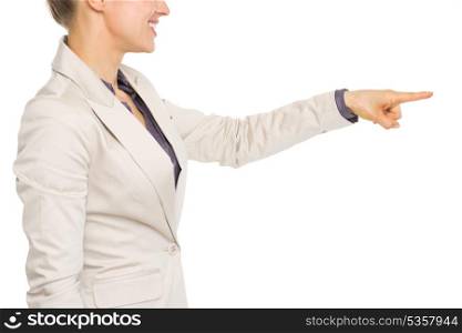 Closeup on business woman pointing in corner