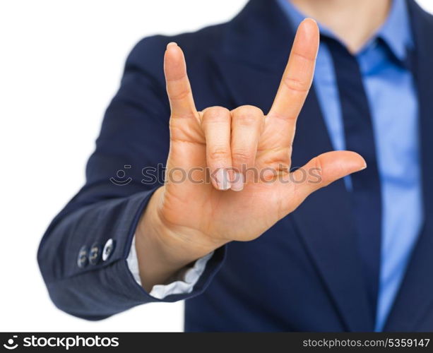 Closeup on business woman showing l love you gesture