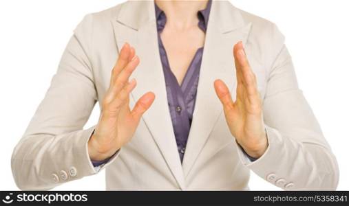 Closeup on business woman showing size with hands
