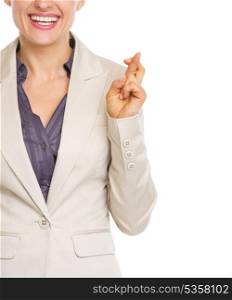 Closeup on business woman with crossed fingers