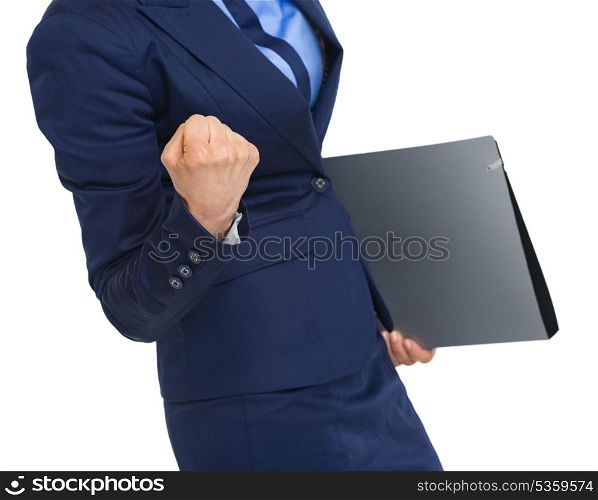Closeup on business woman with folder rejoicing success