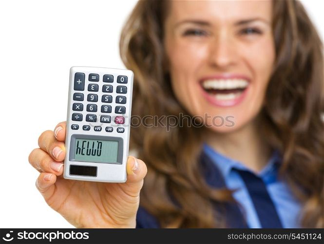 Closeup on calculator with hello inscription in hand of business woman