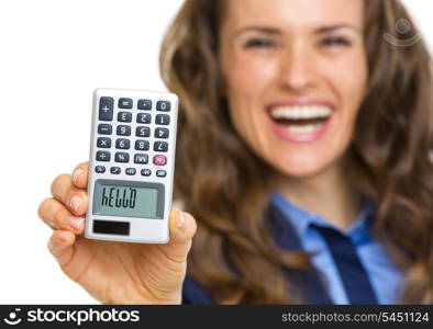 Closeup on calculator with hello inscription in hand of business woman