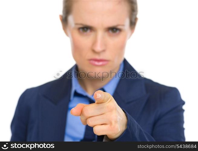 Closeup on concerned business woman pointing in camera