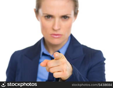 Closeup on concerned business woman pointing in camera