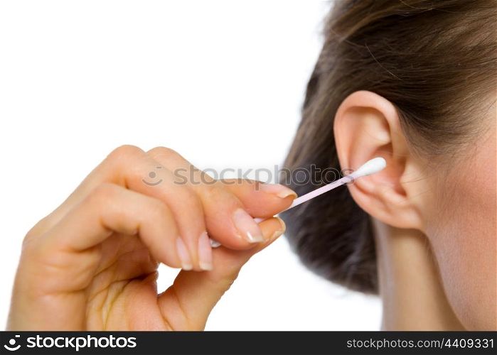 Closeup on cotton swabs in hand of woman