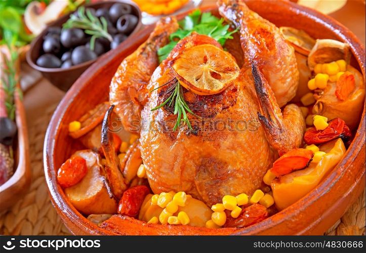 Closeup on delicious baked Thanksgiving turkey baked with vegetables, traditional American autumn holiday, festive dinner at home concept