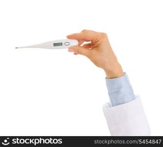 Closeup on doctor hand holding thermometer